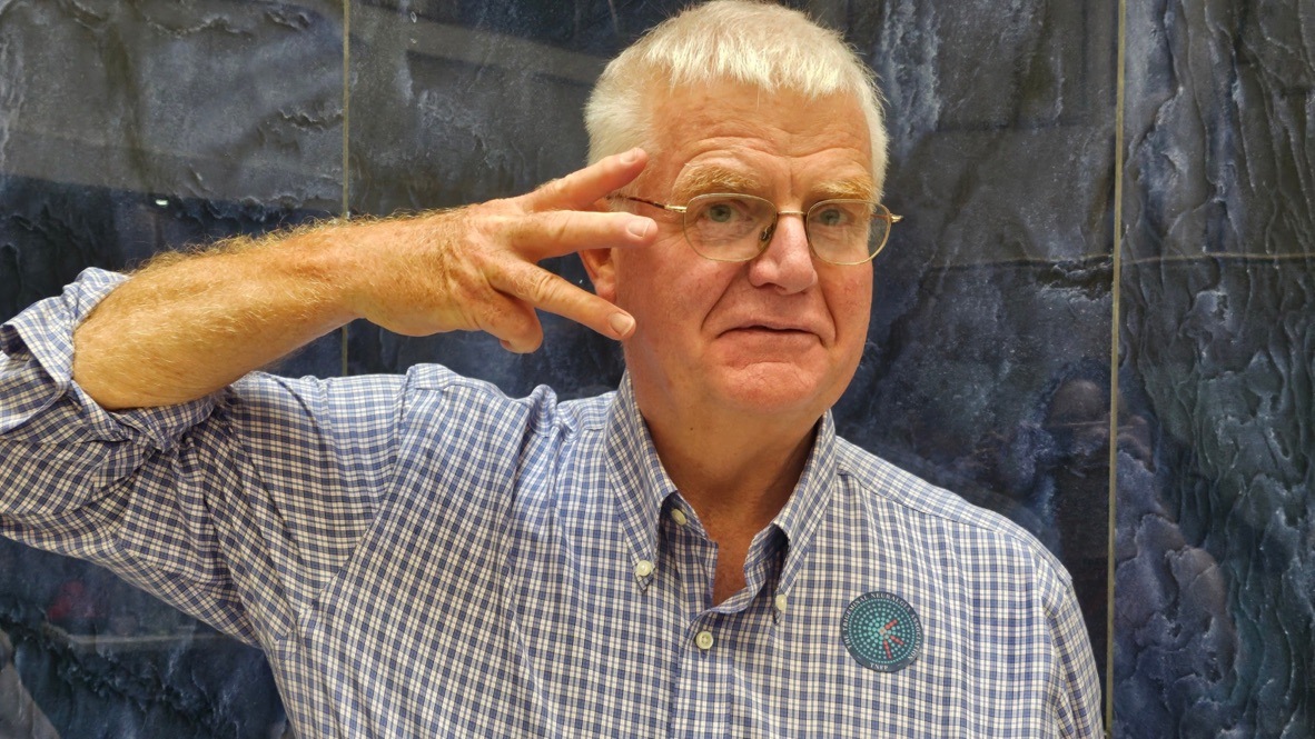 Community participant showing three fingers for trigeminal neuralgia awareness