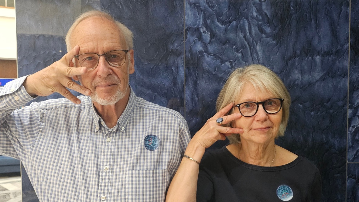 Community participant showing three fingers for trigeminal neuralgia awareness